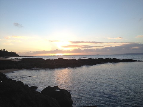 a part of the 90-mile beach, at sunset.