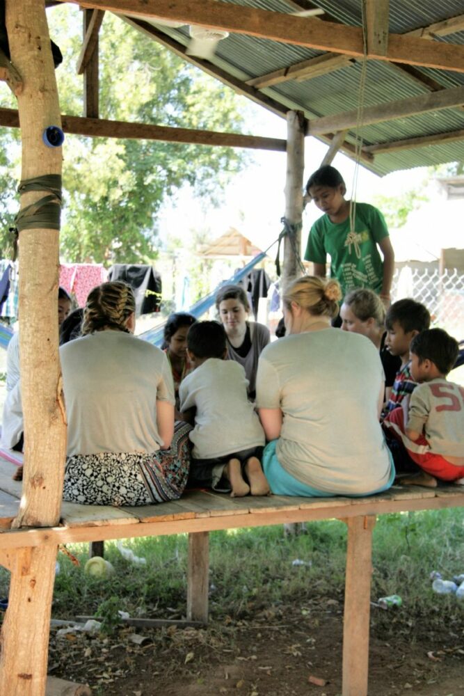 My team playing a card game with the kids at the orphanage.